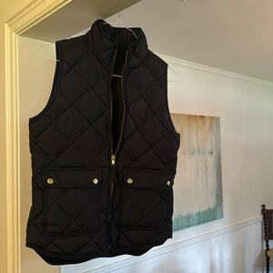 J Crew puffer vest. Navy with Gold buttons and zipper. Woman’s XS.